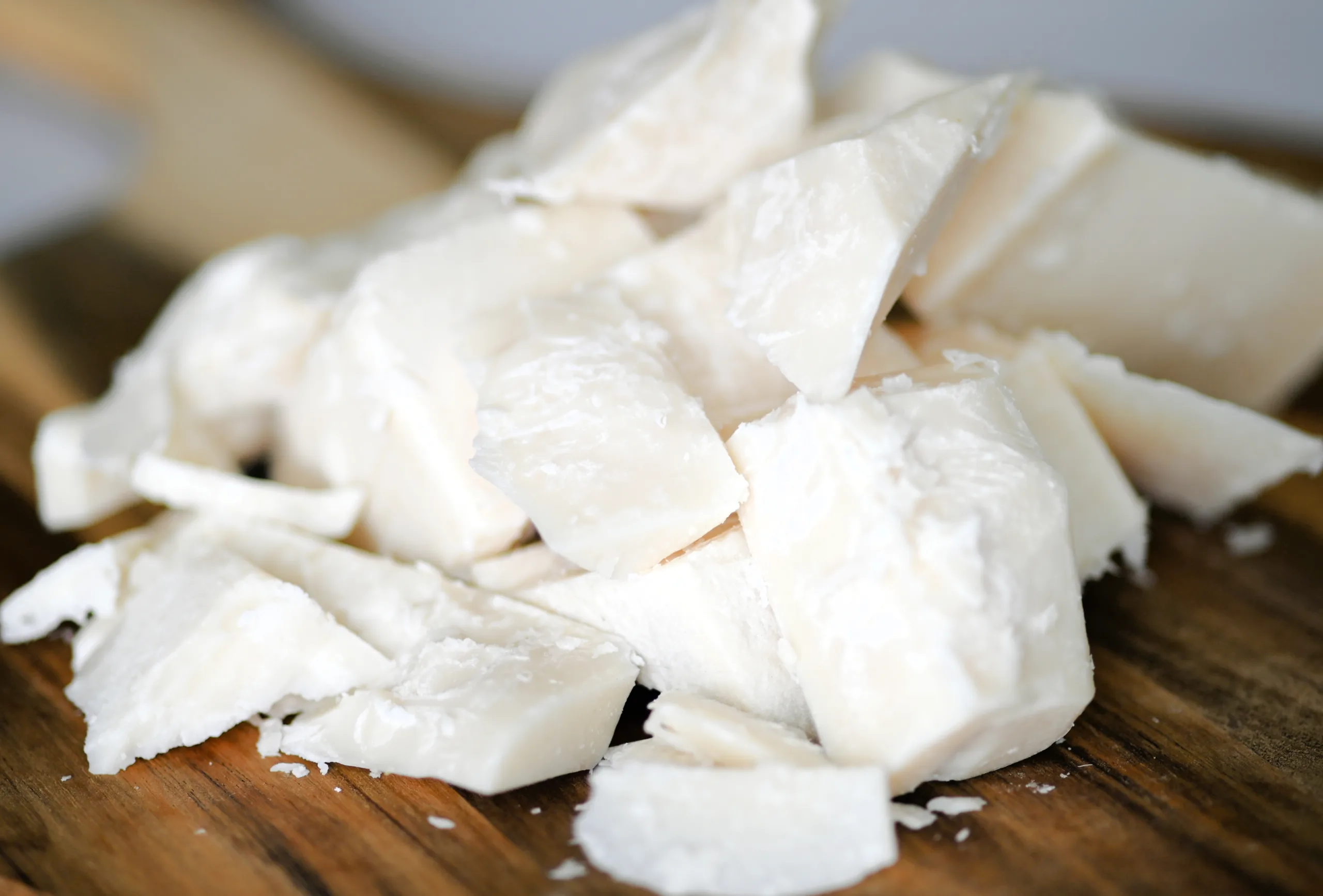Close-up of creamy white beef tallow pieces showing smooth texture after rendering and solidifying.