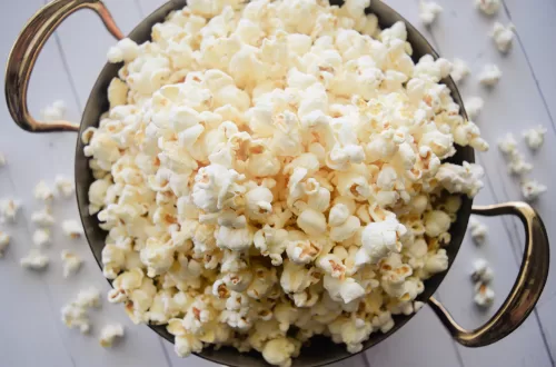Popcorn made from the best oil (coconut oil) in a pot on a white counter top.