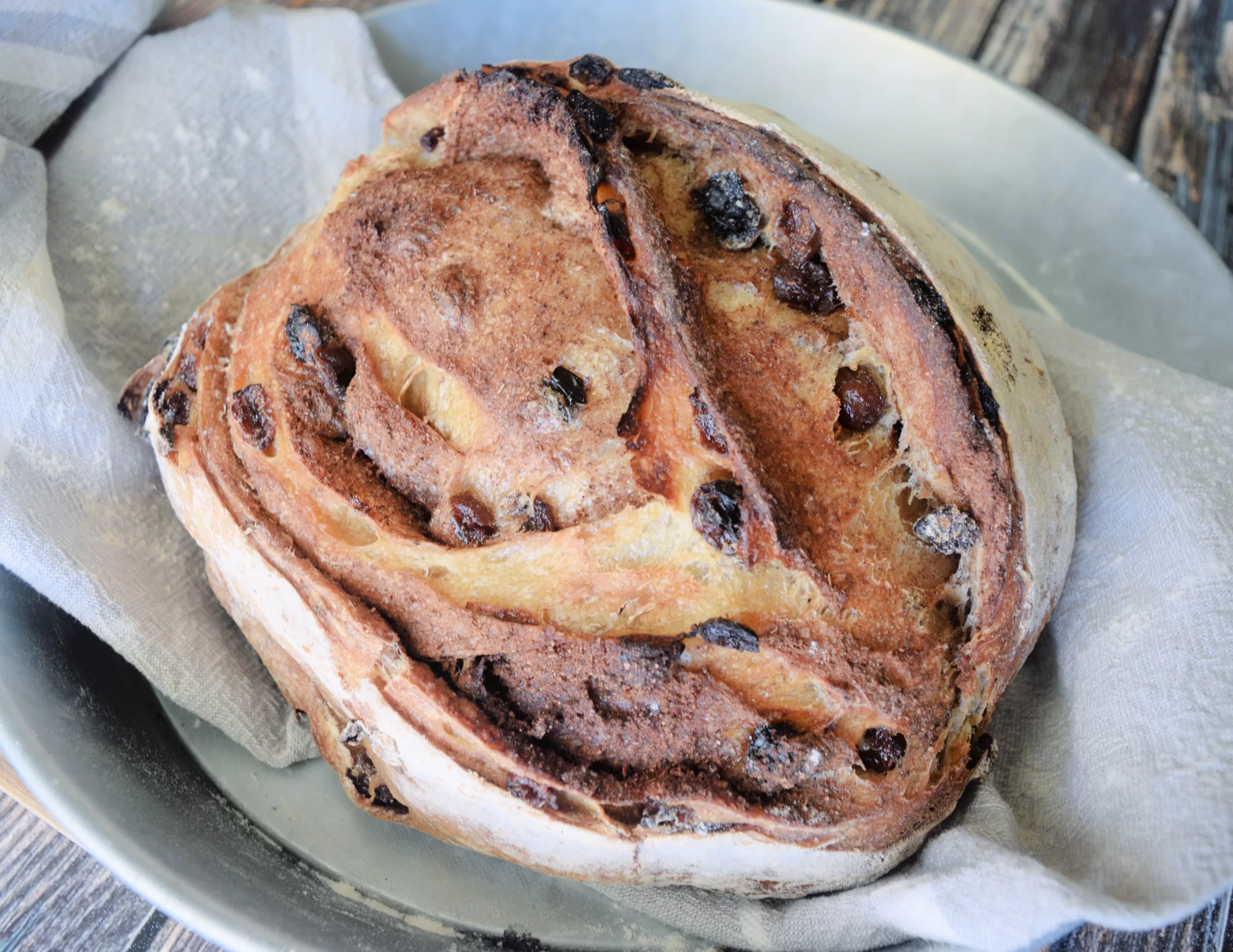 Freshly baked bread for The Best Cinnamon Raisin Sweet Sourdough Bread Recipe.