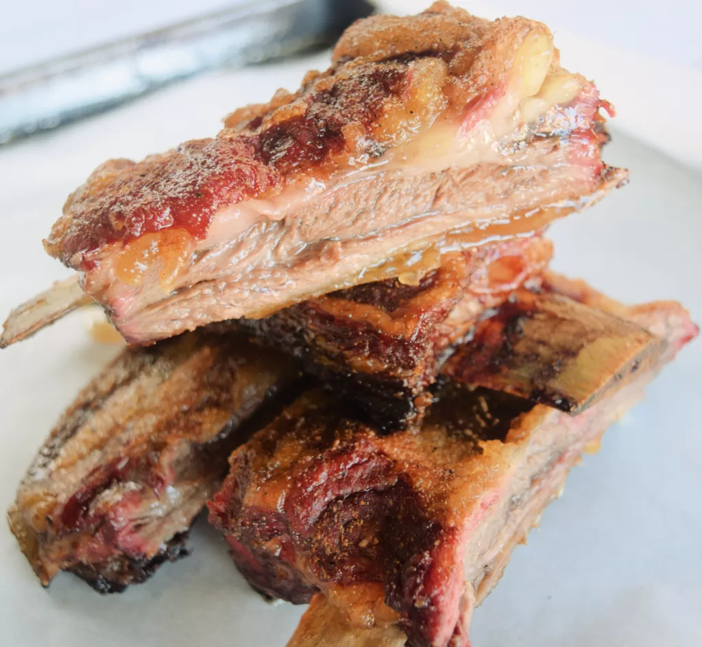 Cooked ribs for The Best Easy Slow Smoked Beef Back Ribs Recipe.
