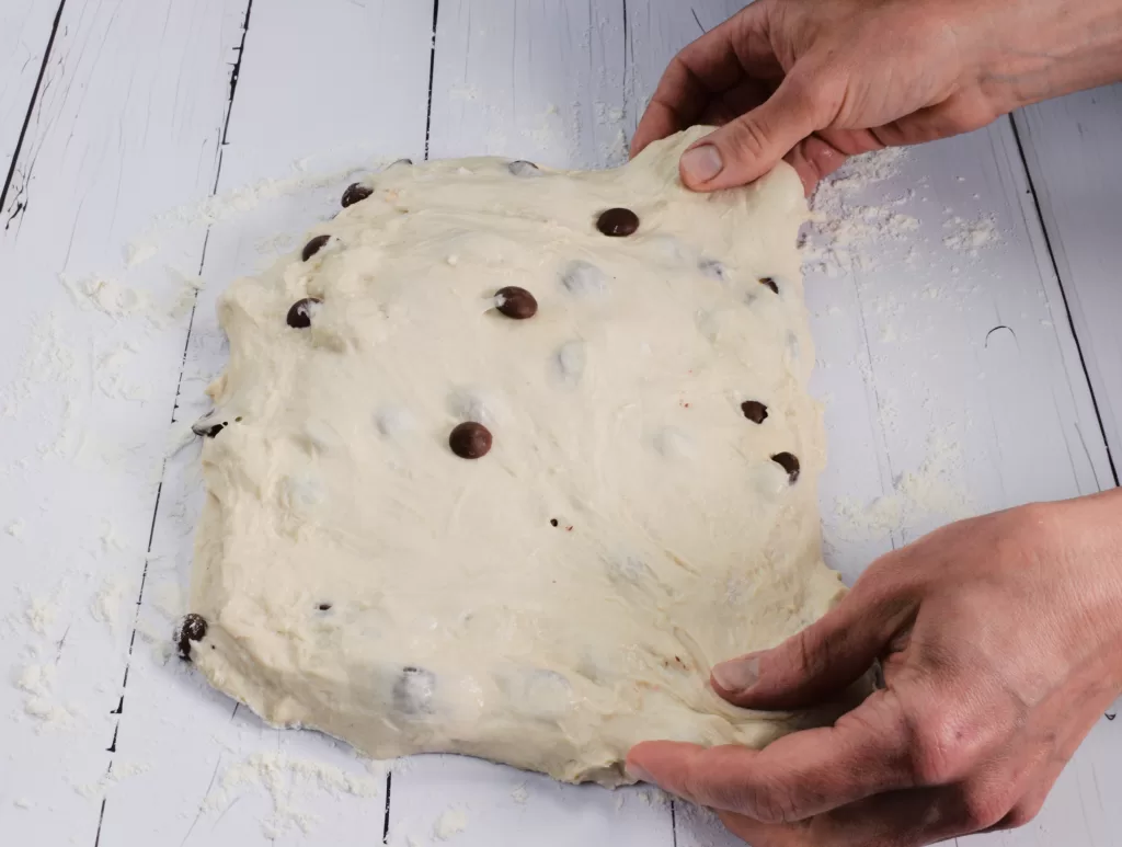 Shaping the dough for Chocolate Chip Swirl Artisan Sourdough Bread Recipe.