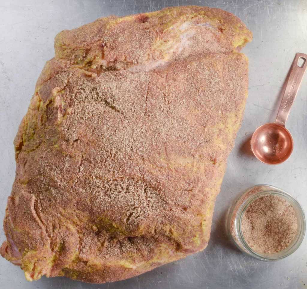 The Perfect Dry Rub Recipe for the Best Pulled Pork rubbed on pulled pork.