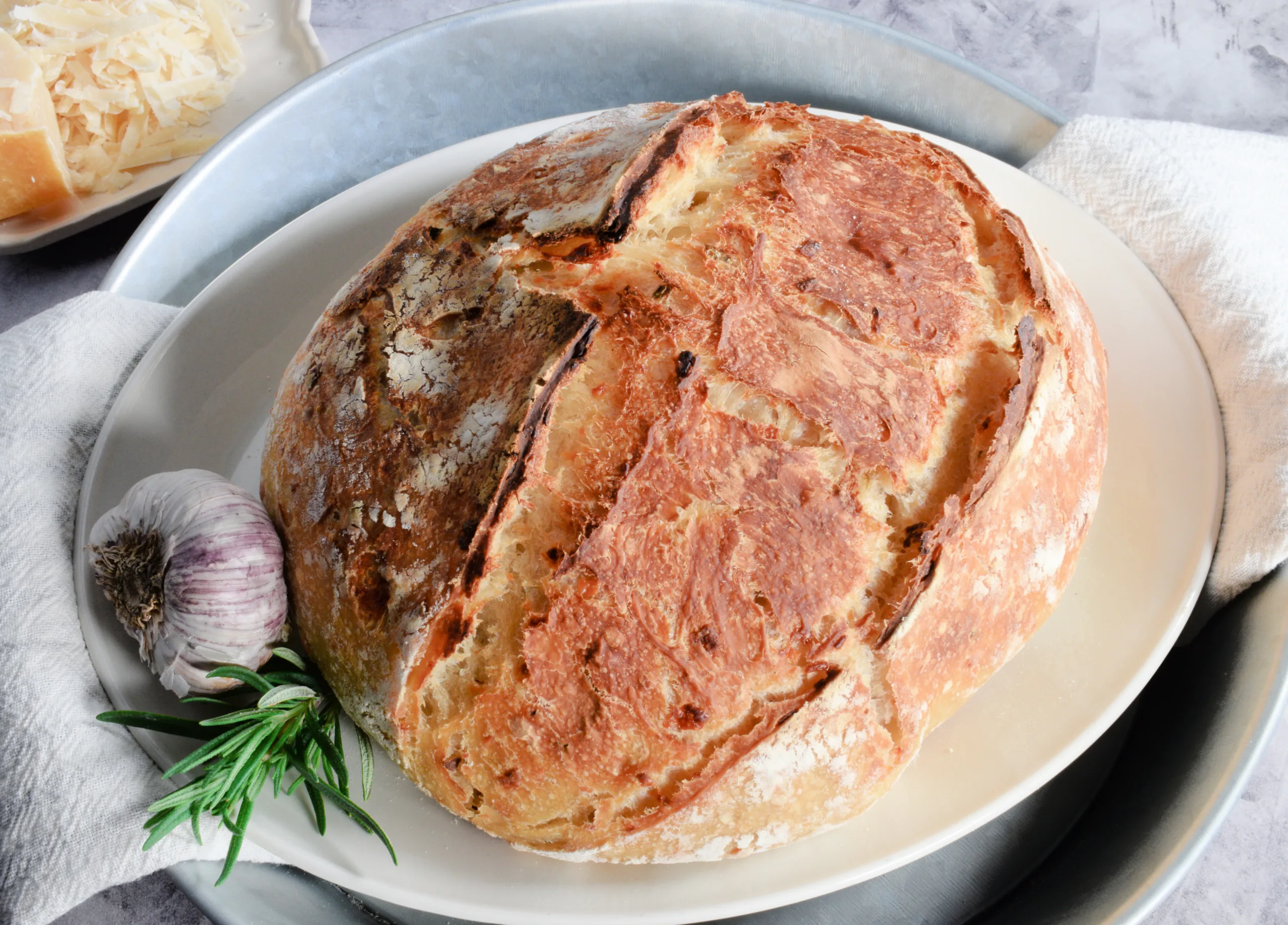 Freshly baked Rosemary Garlic Sourdough Bread with Parmesan Cheese.