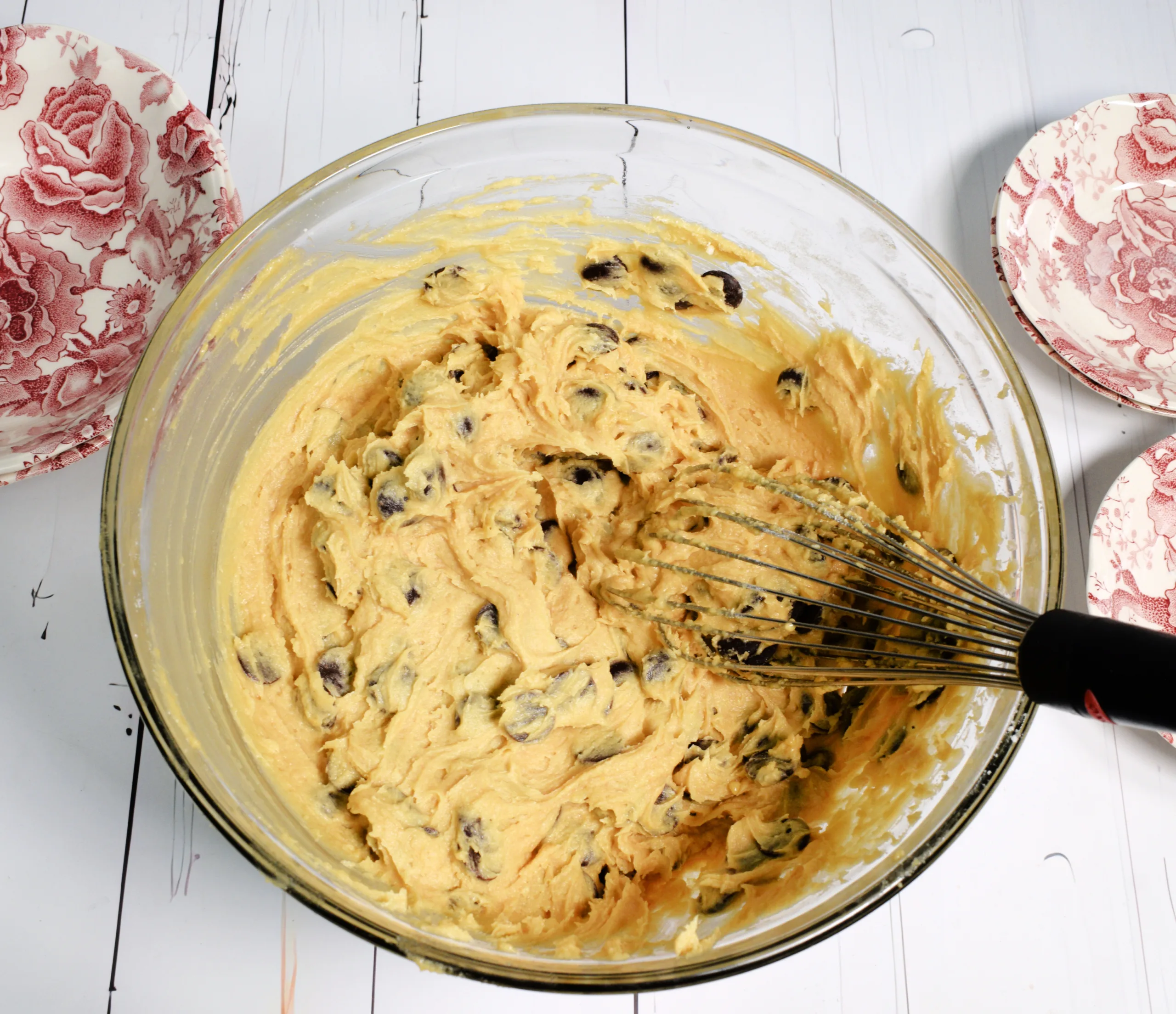 Adding in the chocolate chips to the dough for The Best Sourdough Chocolate Chip Cookies Recipe.