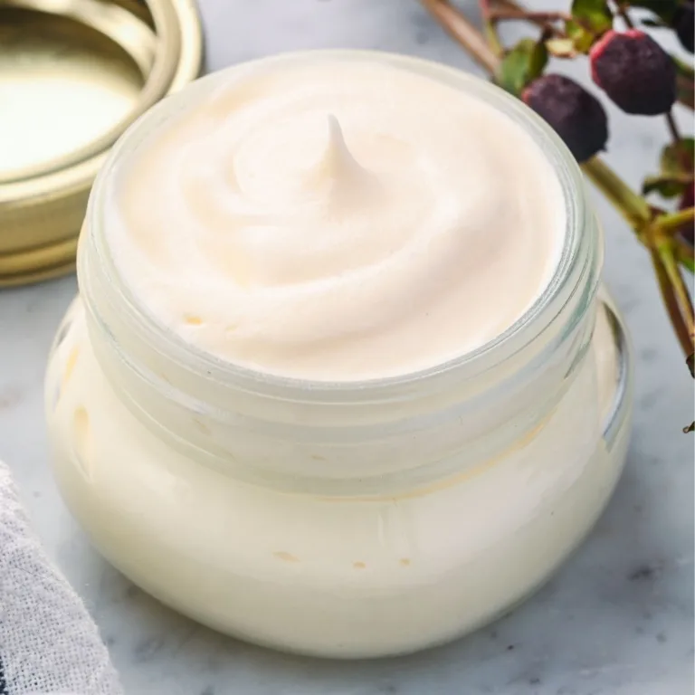 Finished tallow face balm with a smooth, whipped texture in a glass jar, made for fine lines and mature skin using traditional, nourishing ingredients.