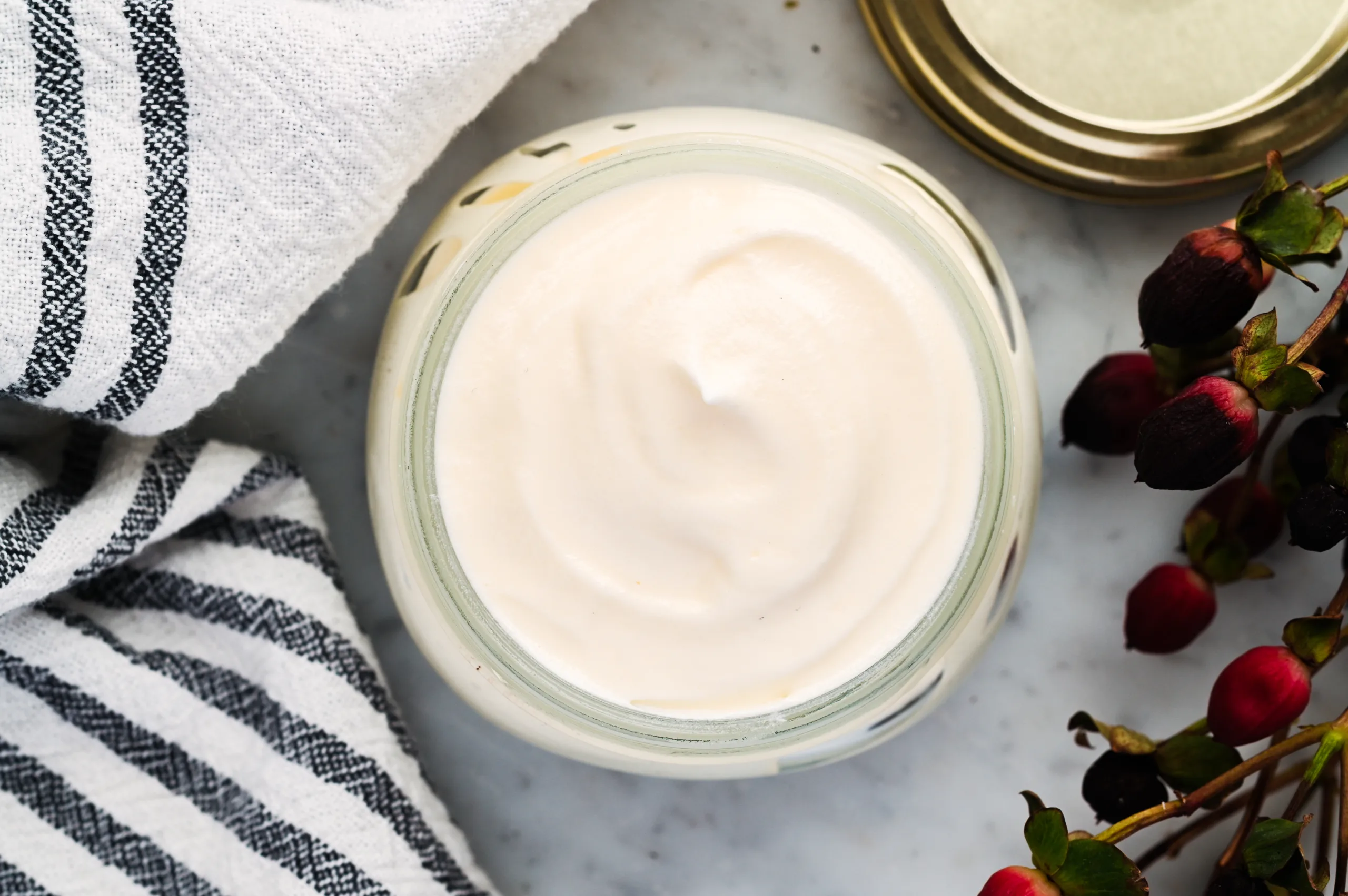 Homemade tallow face balm stored in a jar and ready for everyday skincare use.