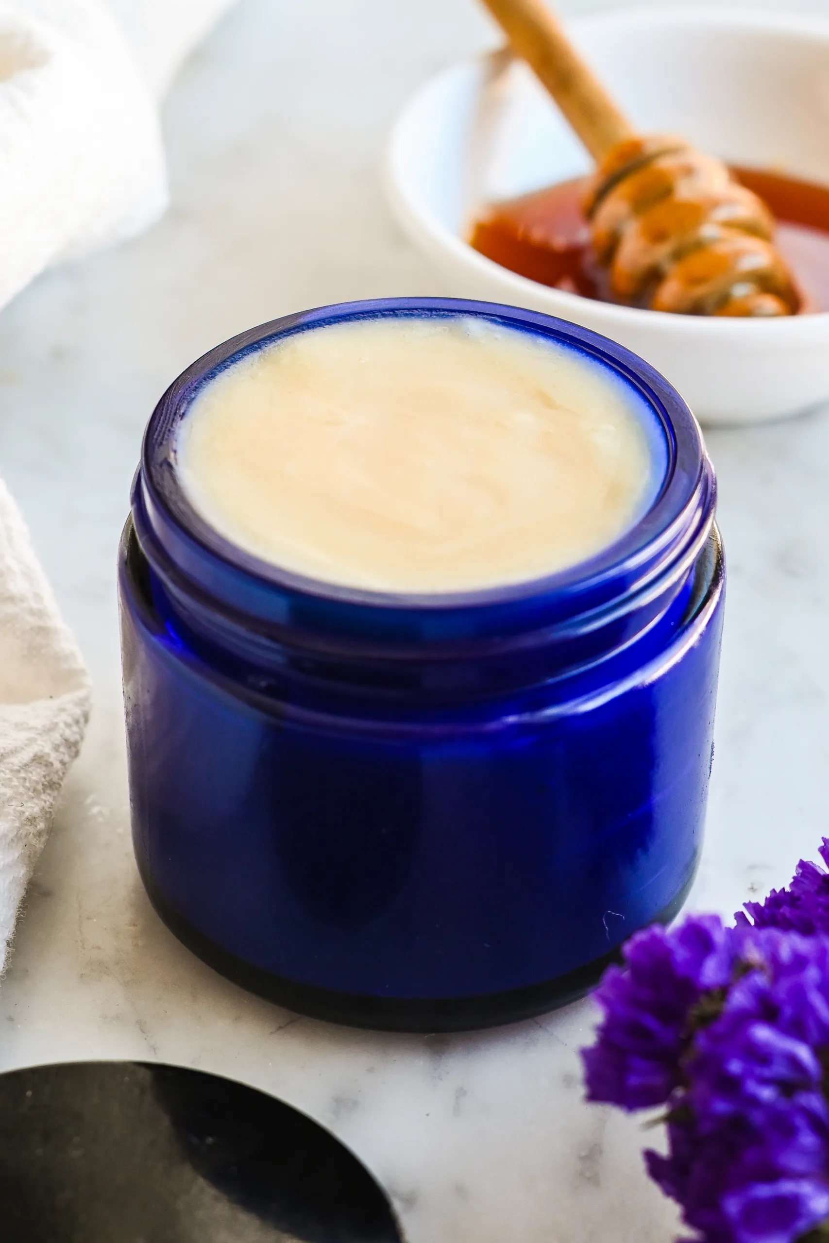 Set tallow honey balm showing a soft, even surface after cooling, ready to use as a natural moisturizing balm for dry skin.